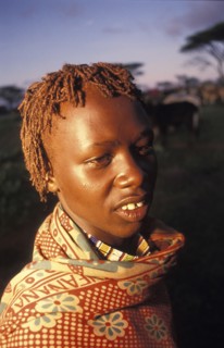 KENYA, Kajiado, Portrait of Torrengai a young Maasai Moran during his initiation into manhood.