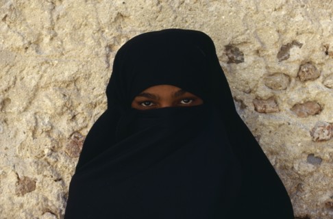 KENYA, Lamu Island, People, Portrait of veiled woman.