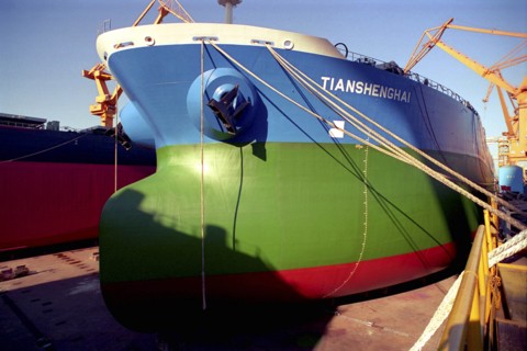 SOUTH KOREA, Pusan, Dae-woos new ship building yard with colourful section of ship