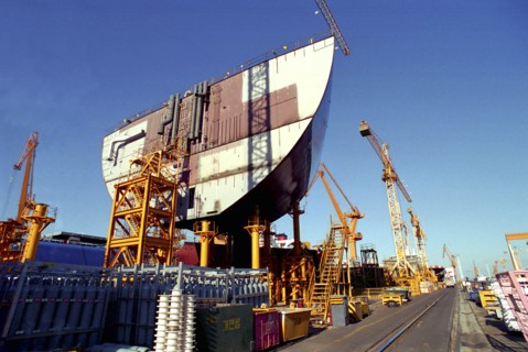 SOUTH KOREA, Pusan, Dae-woos new ship building yard with ship section raised on scaffolding