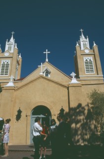 USA, New Mexico, Albuquerque, Tourists outside san Felipe de Neri church in the old town plaza