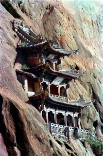 CHINA, Gansu, Zhangye, Mati sa Temple built into the cliff side
