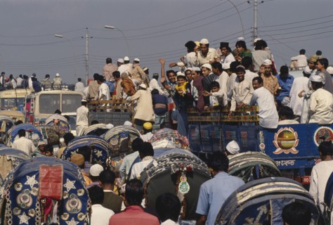 BANGLADESH, Dhaka, Trucks full of Muslim devotees returning from annual Biswa Itema gathering.