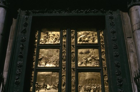 ITALY, Tuscany , Florence, Close up of black wooden Baptistry door of the Duomo with pannels of