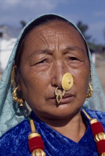 NEPAL, East, Sokropati, Limbuni woman tribeswearing traditional gold Limbu nose jewellery