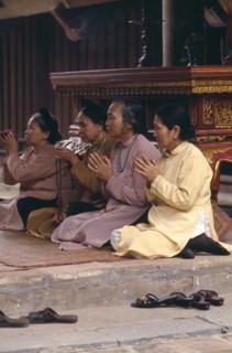 VIETNAM, North, Hanoi, Buddhist people sitting in prayer