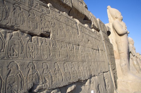 EGYPT, Nile Valley, Karnak, Precinct of Amun.  Detail of relief carving and hieroglyphics along
