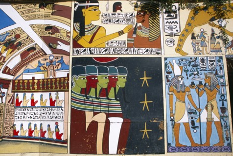 EGYPT, Dra Abul Naga, Detail of painted mural on exterior wall of alabaster shop.