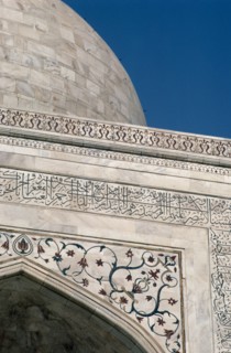 INDIA, Uttar Pradesh, Agra, Detail of semi precious stones inlaid in white marble with Arabic
