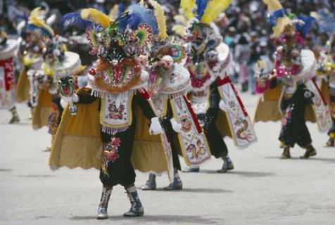 BOLIVIA, Oruro, Carnival masqueraders in colourful animal costumes