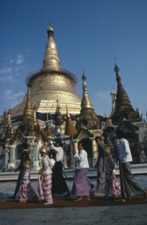 MYANMAR, Yangon, Shwedagon Pagoda.  Initiation of Buddhist novices at Shinpyu ceremony.