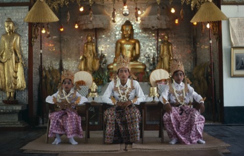 MYANMAR, Religion, Buddhism, Shwedagon Pagoda.  Novice monks at Shinpyu initiation ceremony seated