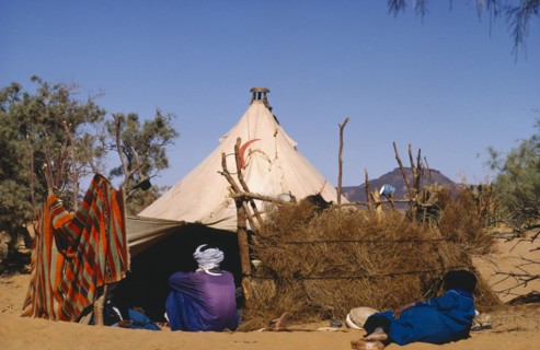 ALGERIA, People, Tuaregs outside tent.