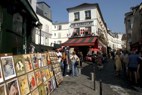 FRANCE, Ile de France, Paris, Posters for sale on a pedestrianized cobbled street