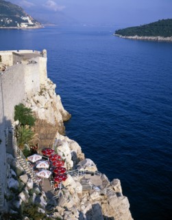CROATIA, Dalmatia, Dubrovnik, Bar on cliff outside the City Wall or Gradske Zidine facing Kolocep