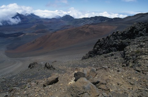 USA, Hawaii, Maui, Cinder cones and iron rich lava weathered to brown oxide in the vast crater of