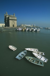 INDIA, Maharashtra, Bombay, Colaba area.  View over harbour toward the Gateway of India with