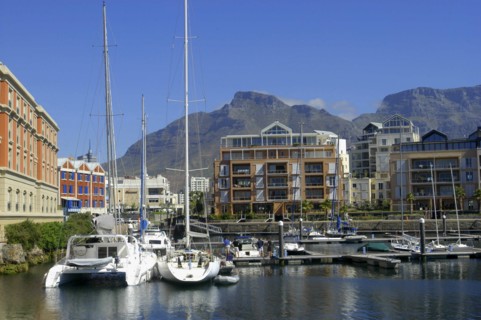 SOUTH AFRICA, Western Cape, Cape Town, View of the waterfront with moored boats and buildings