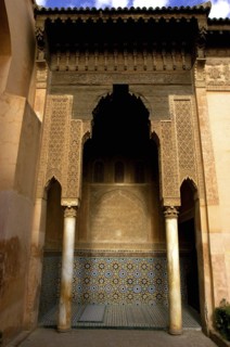 MOROCCO, Marrakech, Saadian Tombs. Ornate archway with paterned tile decoration