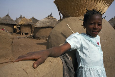 BURKINA FASO, Bisaland, Sigue Voisin Village, Young girl in village near Garango.