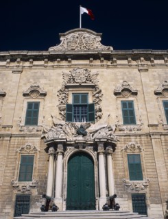 MALTA, Valletta, Auberge de Castille et Leon. Decorative baroque facade with steps leading to green