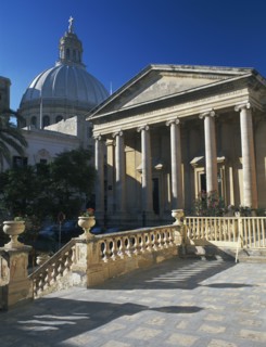 MALTA, Valletta, St Pauls Anglian Cathedral with Dome of carmelite Church behind.