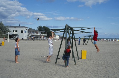 ESTONIA, Parnu, Children playing on the beach.