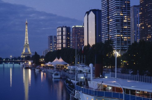 FRANCE, Ile de France, Paris, Modern high rise buildings and the Eiffel Tower from the banks of the