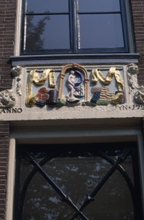 HOLLAND, Noord, Amsterdam, Close up detail of a wall tablet used before house numbers were added