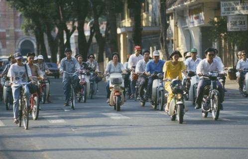 VIETNAM, South, Ho Chi Minh City, Mopeds and cyclists