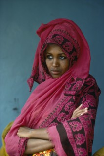SOMALIA, People, Portrait of young woman in traditional shawl