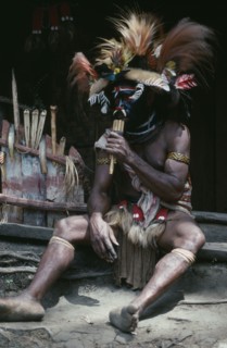 PAPUA NEW GUINEA, Southern Highlands, Near Tari, Paya or traditional healer sitting down