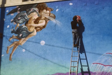 USA, California, Los Angeles, Painter working on mural based on Botticelli painting of Venus.