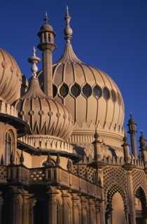 ENGLAND, Sussex, Brighton, Brighton Pavilion exterior section showing onion domes in evening light