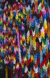 JAPAN, Honshu, Hiroshima, Peace Memorial Park. Mass of multi coloured origami cranes at the
