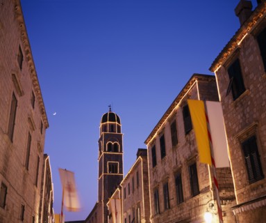 CROATIA, Dalmatia, Dubrovnik, View along the Stradun toward the Francisan Monastery tower