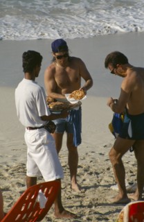 CUBA, Matanzas Province, Varadero, Man selling pizza to tourists on the beach