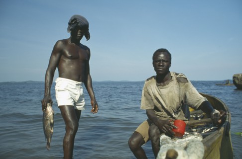 UGANDA, Kampala, Men fishing in Lake Victoria.