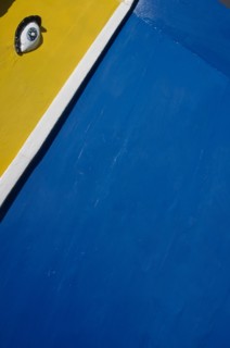 MALTA, Marsaxlokk, Detailed view of colourful Luzzu boat with watchful eye.