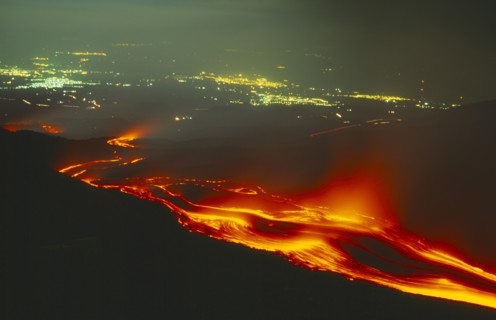 ITALY, Sicily, Night-time view of Volcano erupting. Lava flow from the Monti Calcarazzi fissure.