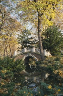 FRANCE, Ile de France, Paris, Parc Monceau created by landscape designer Louis Carmontelle.  Arched