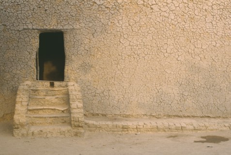 MALI, Djenne, "Mud house, exterior detail with steps leading to doorway"