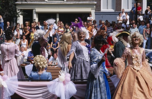 HOLLAND, Noord, Amsterdam, Gay Pride canal parade with men dressed in historical womens cotumes