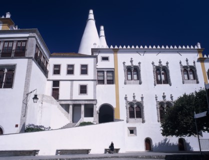 PORTUGAL, Sintra, "Palacio Nacional de Sintra facade and huge conical chimneys above, dating from
