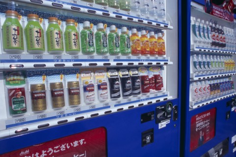 JAPAN, Honshu, Tokyo, Asakusa. View along cold drinks vending machines