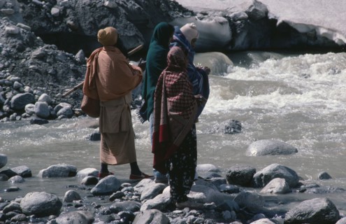 INDIA, Uttar Pradesh, Garhwal Region, Pilgrims bathing in snow melted water at Gormuich the Cows