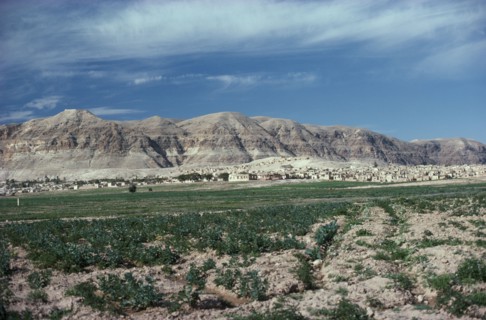 ISRAEL, West Bank, View over landscape toward the Judean Hills near Jericho with houses at the base