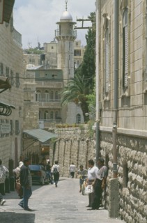 ISRAEL, Jerusalem, Old City East, Via Dolorosa narrow street lined with shops. Aka The Way of