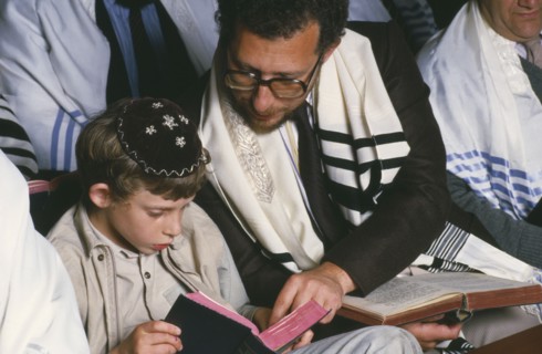 ENGLAND, Religion, Judaism, Jewish father and son attending preparation for Bar Mitzwah in