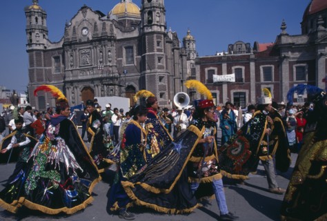 MEXICO, Mexico City, Celebrations for Our Lady of Guadaloupe outside the Basilica with dancers in
